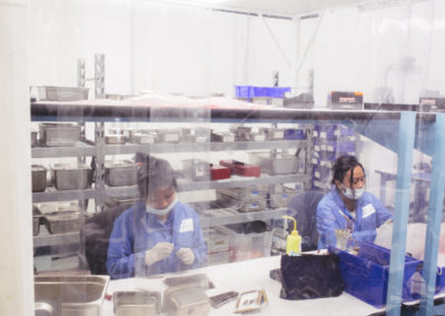 associates in a dedicated clean room for subassembly and turnkey production