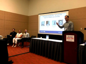 Moderator Pete Karns leads the MassTLC panel discussing the future of healthcare and IoT, with panelists (L to R) Peter Rizzo, Denise Fletcher, and Sean Lorenz.