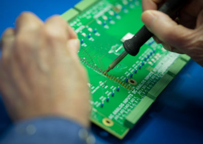 Delicate components are soldered individually by a trained and certified solder technician