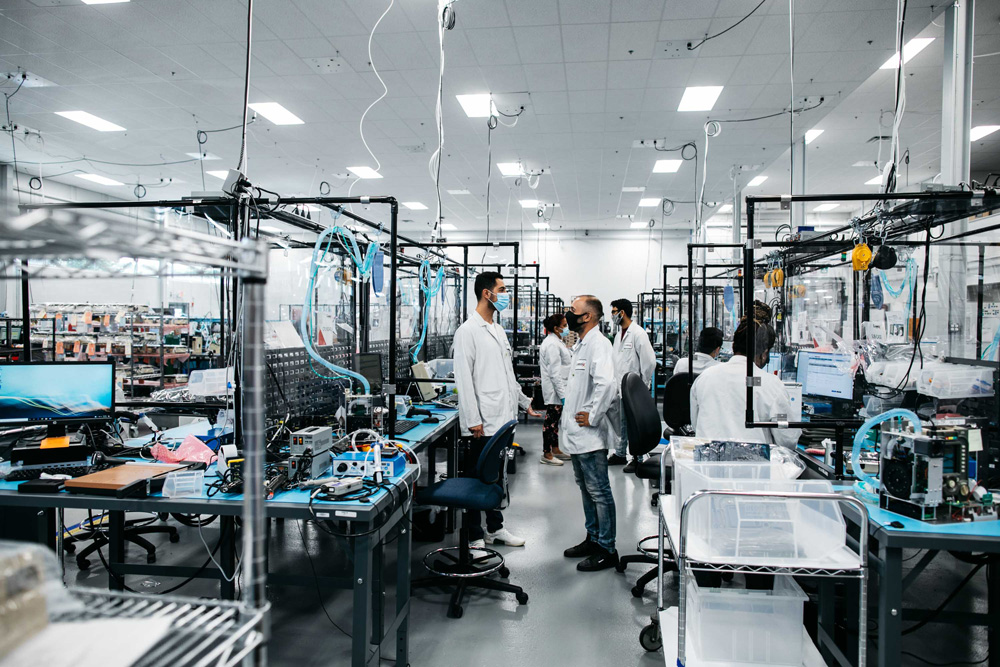 medical device assembly associates working on a manufacturing floor.